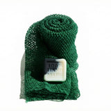 Green mesh Enso Sapo body exfoliator with a 2 oz bestselling Enso bar soap on a white background